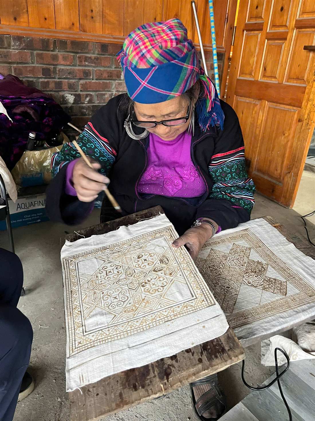 Hand-drawing batik wax patterns