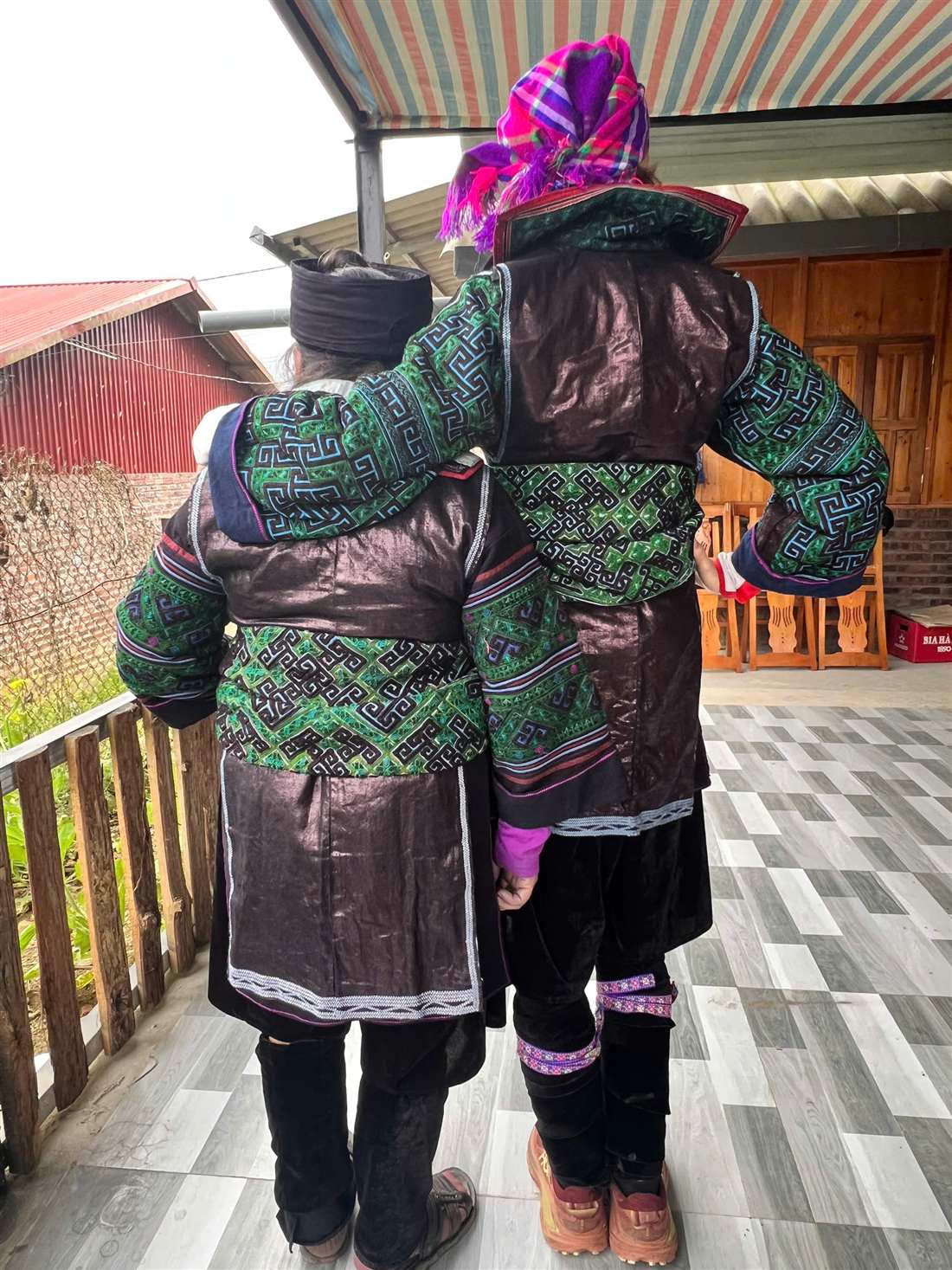 Two Hmong women in traditional dress